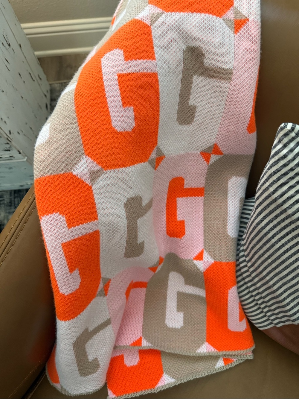 BaubleBar Orange and Beige Geometric G Knit Throw
